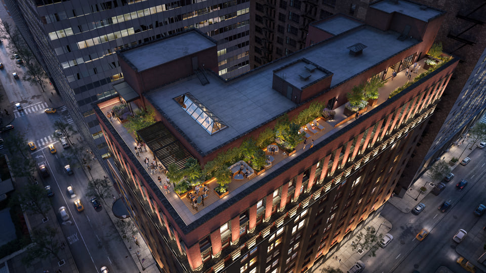 79 Monroe, Chicago IL — Ware Malcomb. Rooftop deck at dusk with fire feature and downtown skyline glow by Radical Galaxy Studio