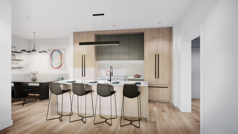 Kitchen with natural wood cabinetry and stone island.