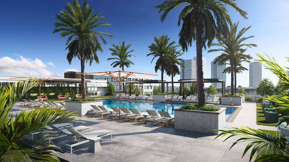 Cortland, Fort Lauderdale FL — Cortland. Rooftop pool with skyline-facing deck, sun shelves, and shaded daybeds by Radical Galaxy Studio