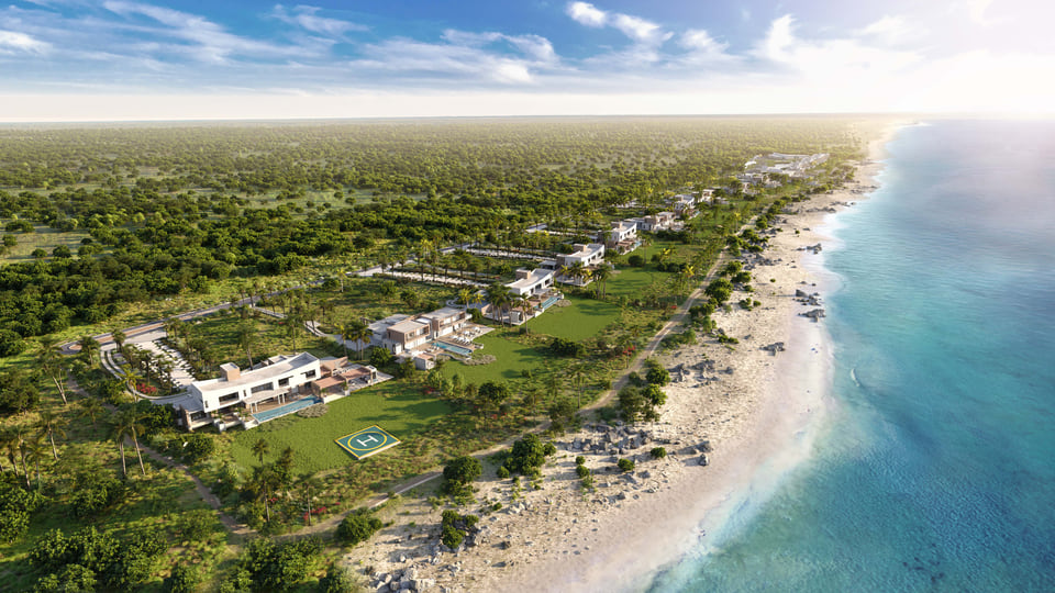 Aerial rendering of a private Caribbean beachfront estate with a helipad, terraced villas, and a chain of homes stretching along a turquoise coastline
