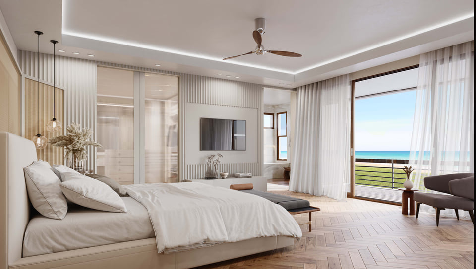 A rendering of a spacious master bedroom in a Caribbean island home, with a plush bed, large sliding doors leading to a balcony, and coastal-inspired furnishings.