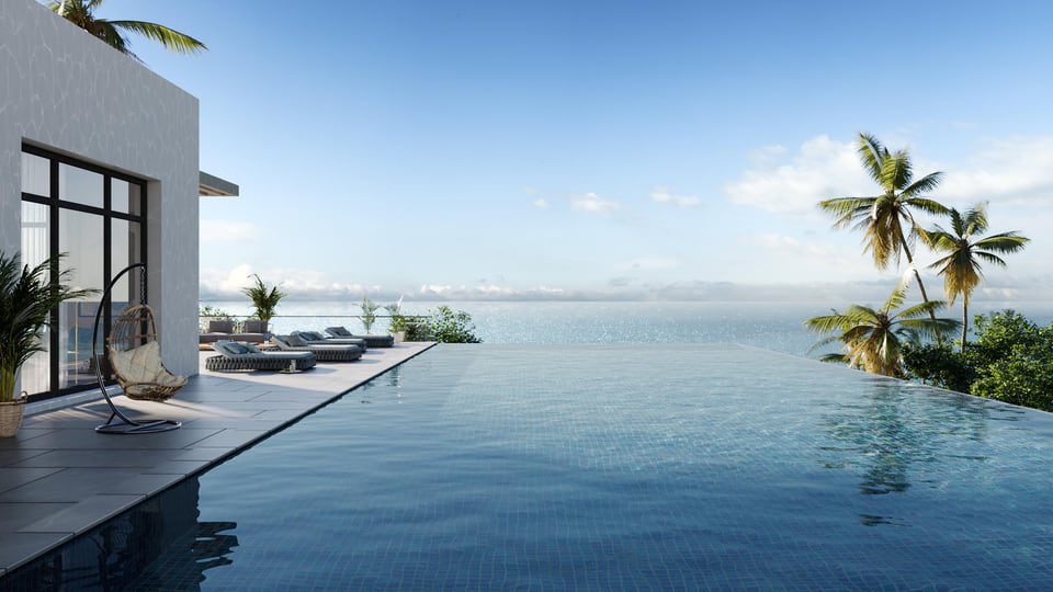 Habacoa, Bahamas — oceanfront infinity pool terrace with palms and open sea views
